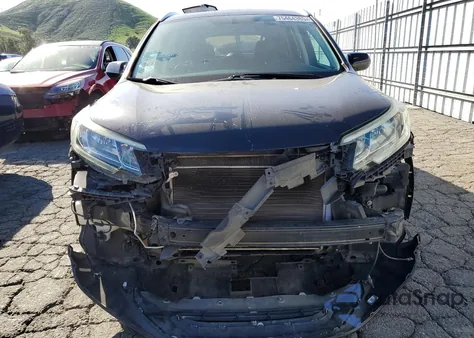 2015 Honda Cr-V Exl z USA, uszkodzony, nr VIN 2HKRM3H76FH537501